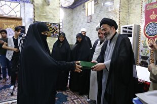 تجلیل از خانواده شهدای مقاومت در کربلا